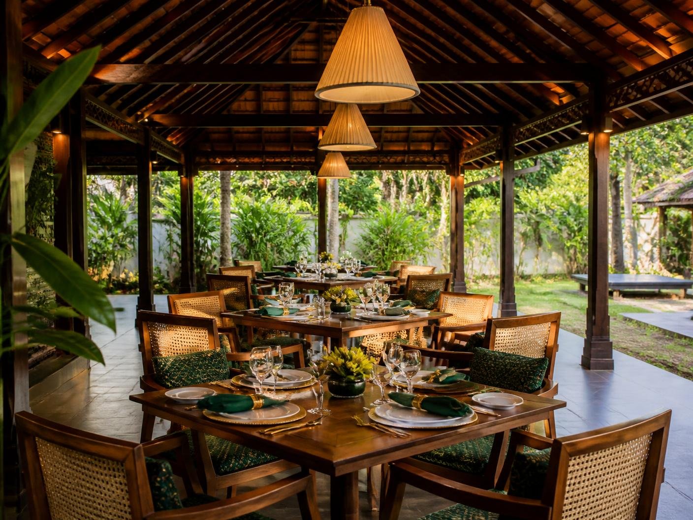 Elegant open-air Kerala resort dining pavilion